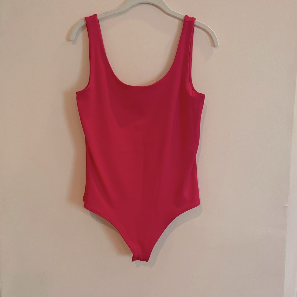 Magenta body contour body suit